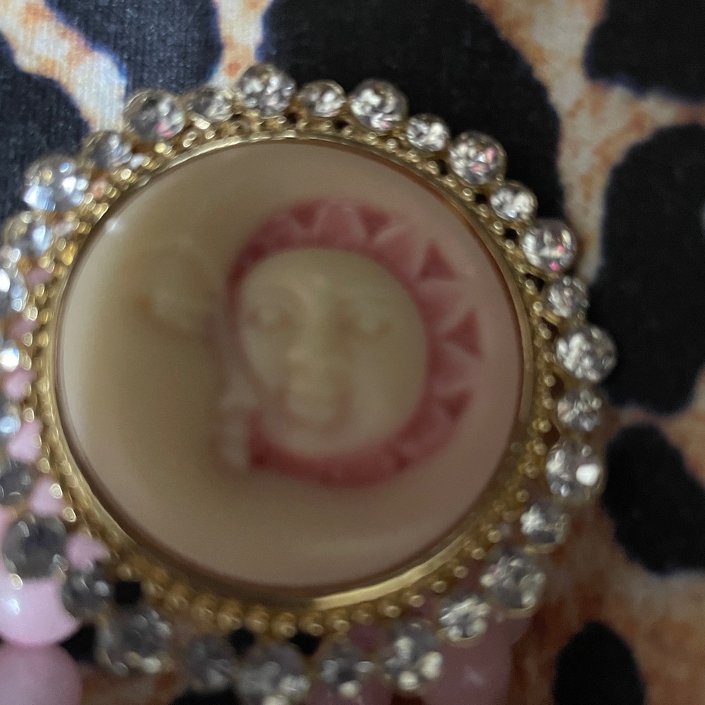 Pink beaded 7 inch stretch bracelet  new. Moon face design. Pretty.